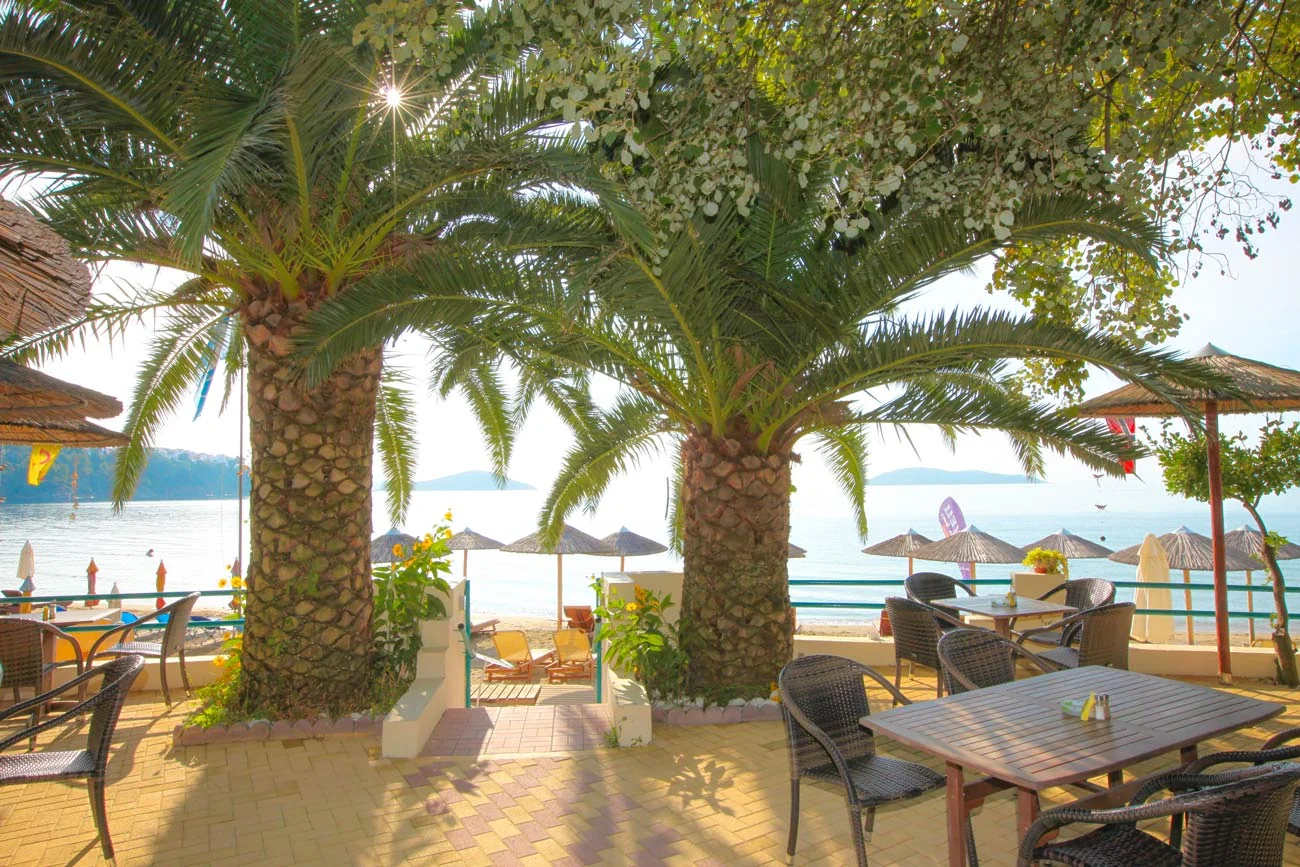 Shaded tables at Swell looking onto Megali Ammos